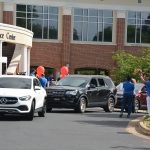 Cars lined up in front of the Conference Center