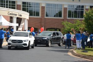 Cars lined up in front of the Conference Center