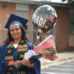 Woman with flowers and balloons