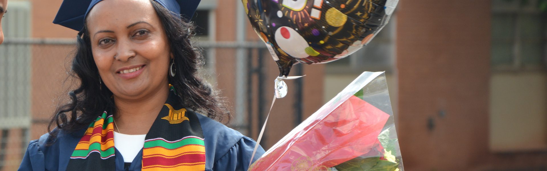 Woman with flowers and balloons