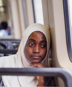 Batulo Ramadhan, a Georgia Piedmont GED Student, on MARTA heading to work.