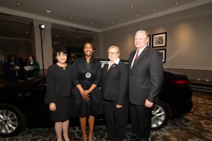 Crystal Wright with Deputy Commissioner Linda Osborne Smith, Deputy Commissioner Martha Ann Todd, and Commissioner Matt Arthur.