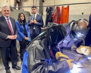 AG Garland watches welding demo