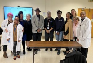 faculty and staff at the opticianry scholarship presentation