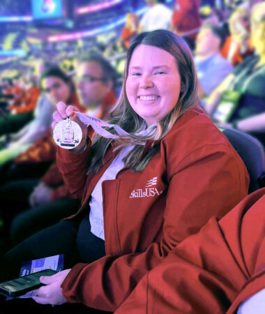 Maghen Hicks showing gold medal